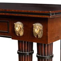 A Regency Part Ebonized and Ormolu-Mounted Mahogany Console Table