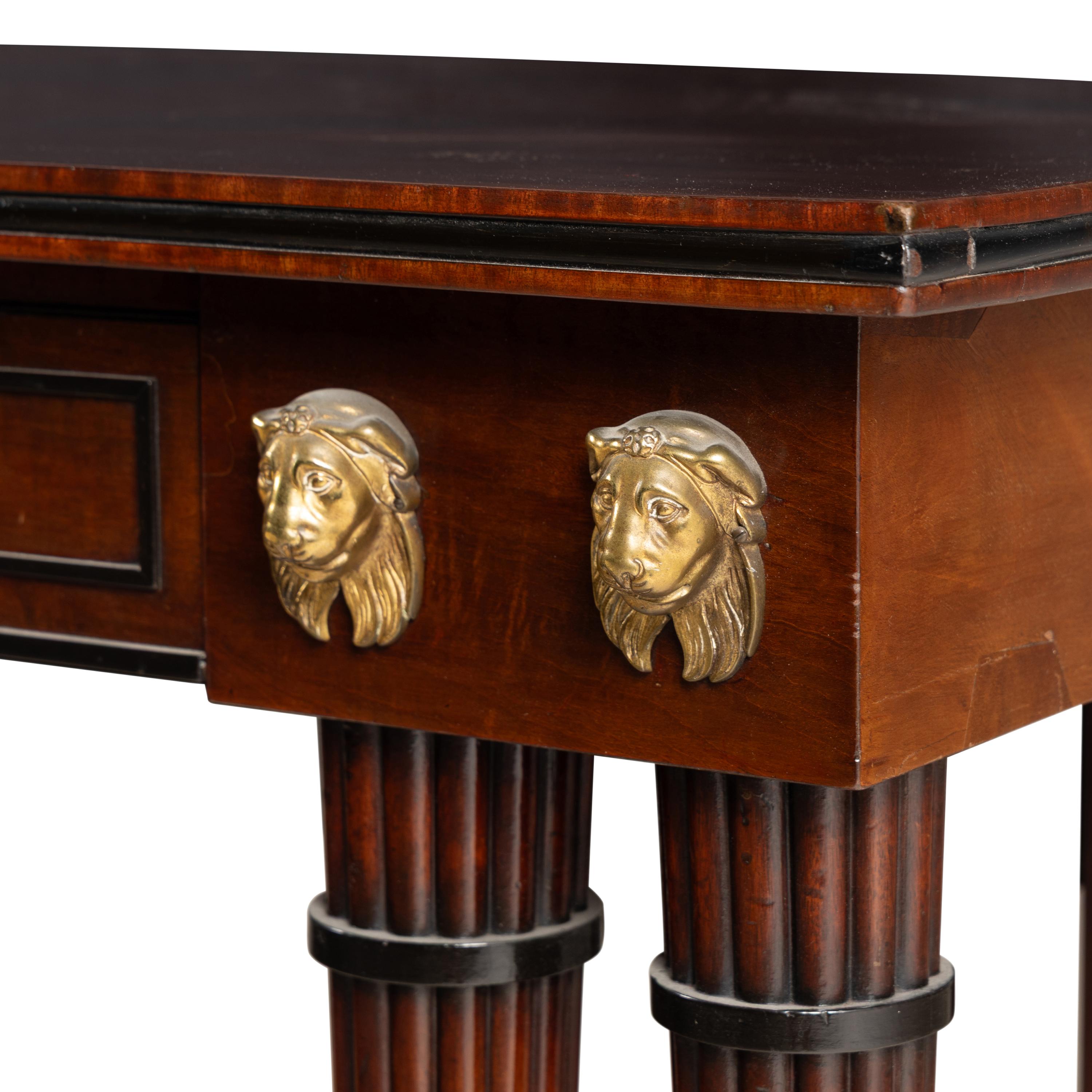 A Regency Part Ebonized and Ormolu-Mounted Mahogany Console Table