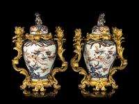 A Pair of Japanese Imari Porcelain Covered Jars