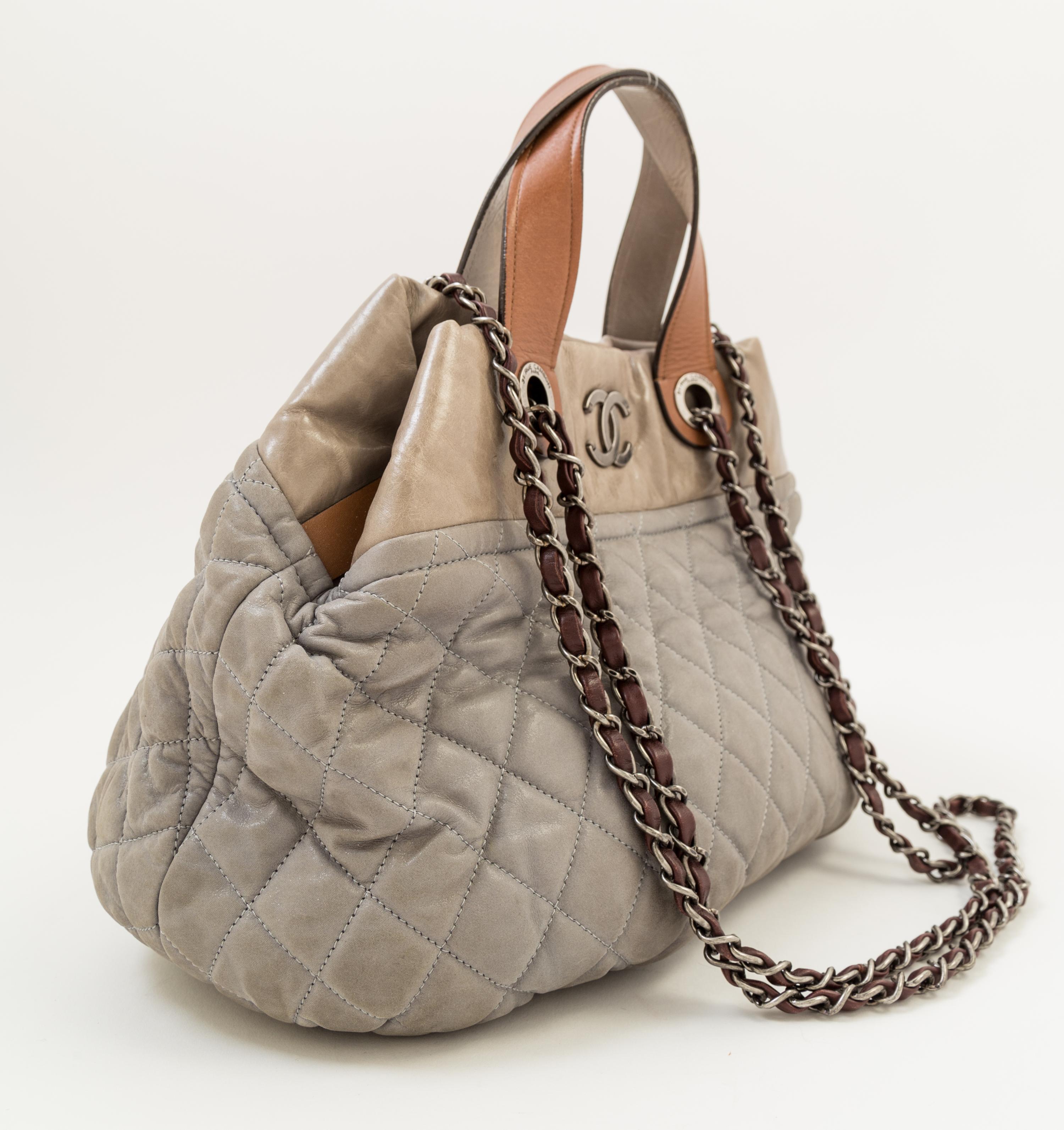 A Chanel Grey Leather Quilted Handbag, 15" x 10" x 5.5"; Handle drop: 4".