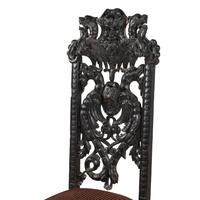 A Renaissance Revival Carved Oak Chair
