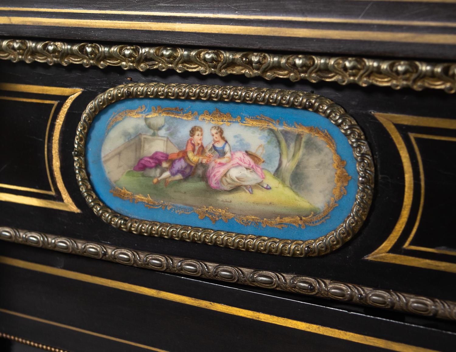 A French Ebonized, Gilt Bronze and Porcelain Mounted Console Cabinet