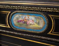 A French Ebonized, Gilt Bronze and Porcelain Mounted Console Cabinet