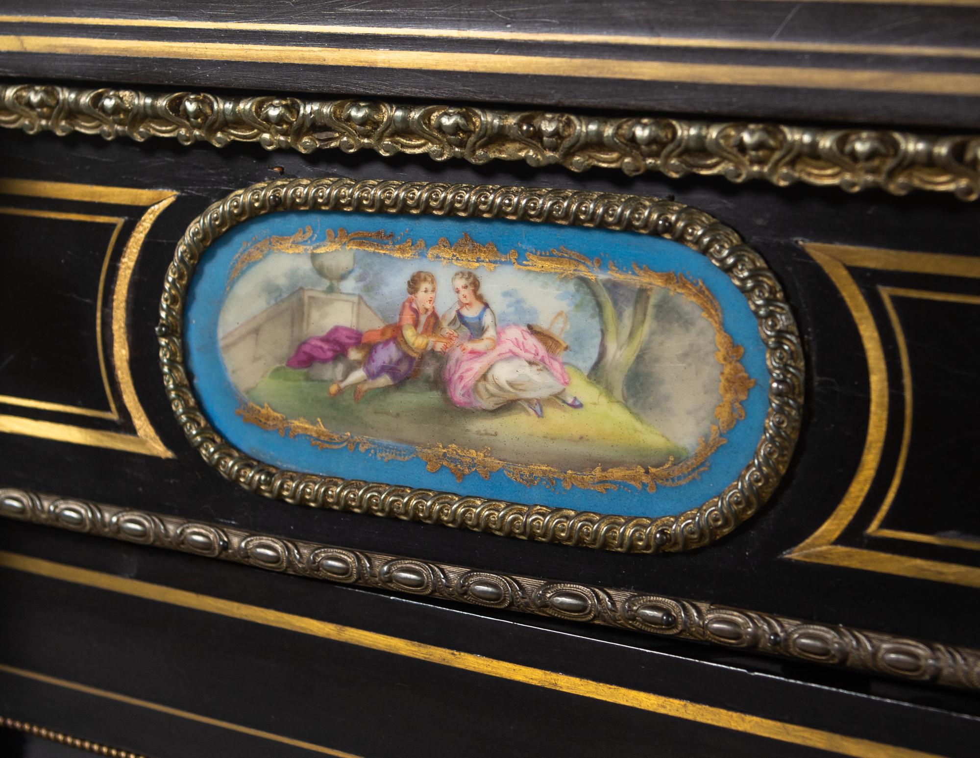 A French Ebonized, Gilt Bronze and Porcelain Mounted Console Cabinet