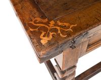 A Swiss Baroque Walnut and Hollywood Marquetry Draw-Leaf Table