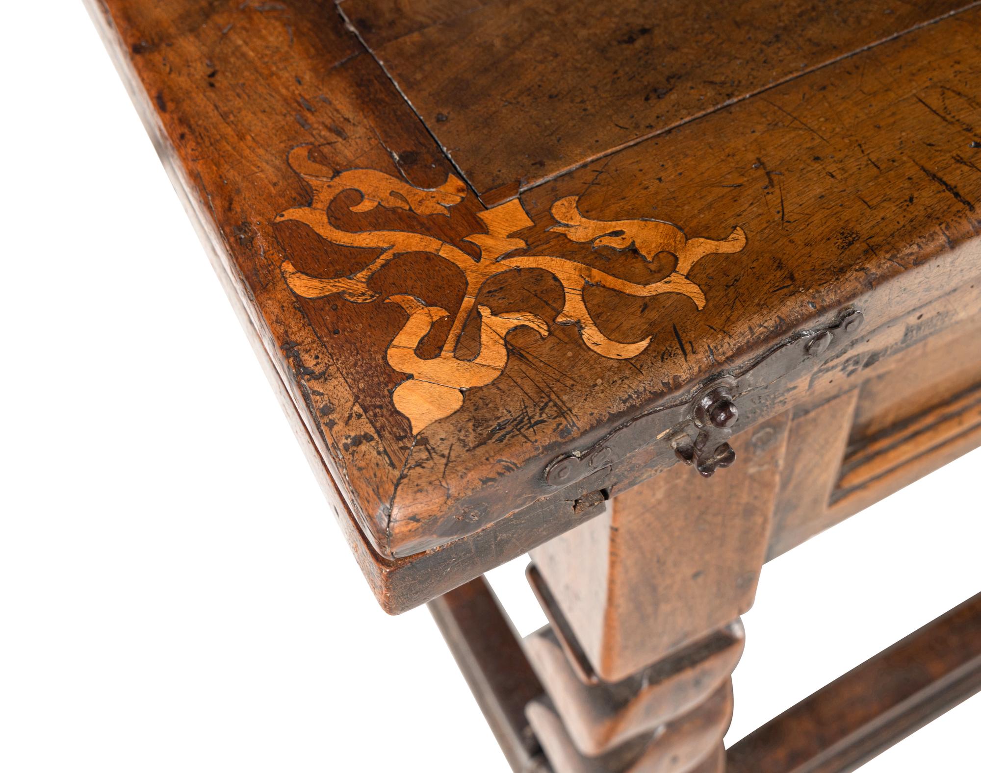 A Swiss Baroque Walnut and Hollywood Marquetry Draw-Leaf Table