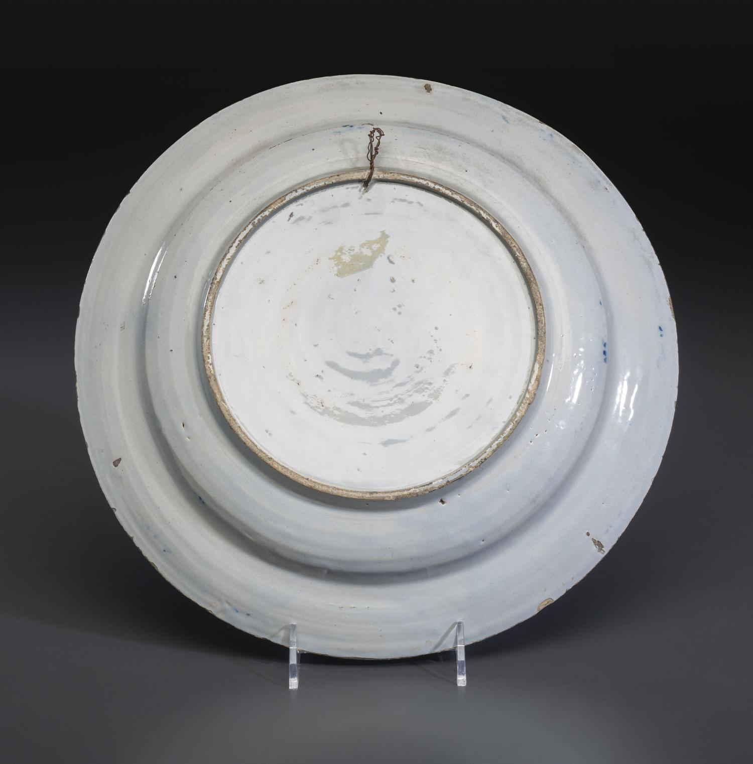 A Floral Decorated Delftware Charger