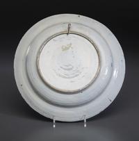A Floral Decorated Delftware Charger
