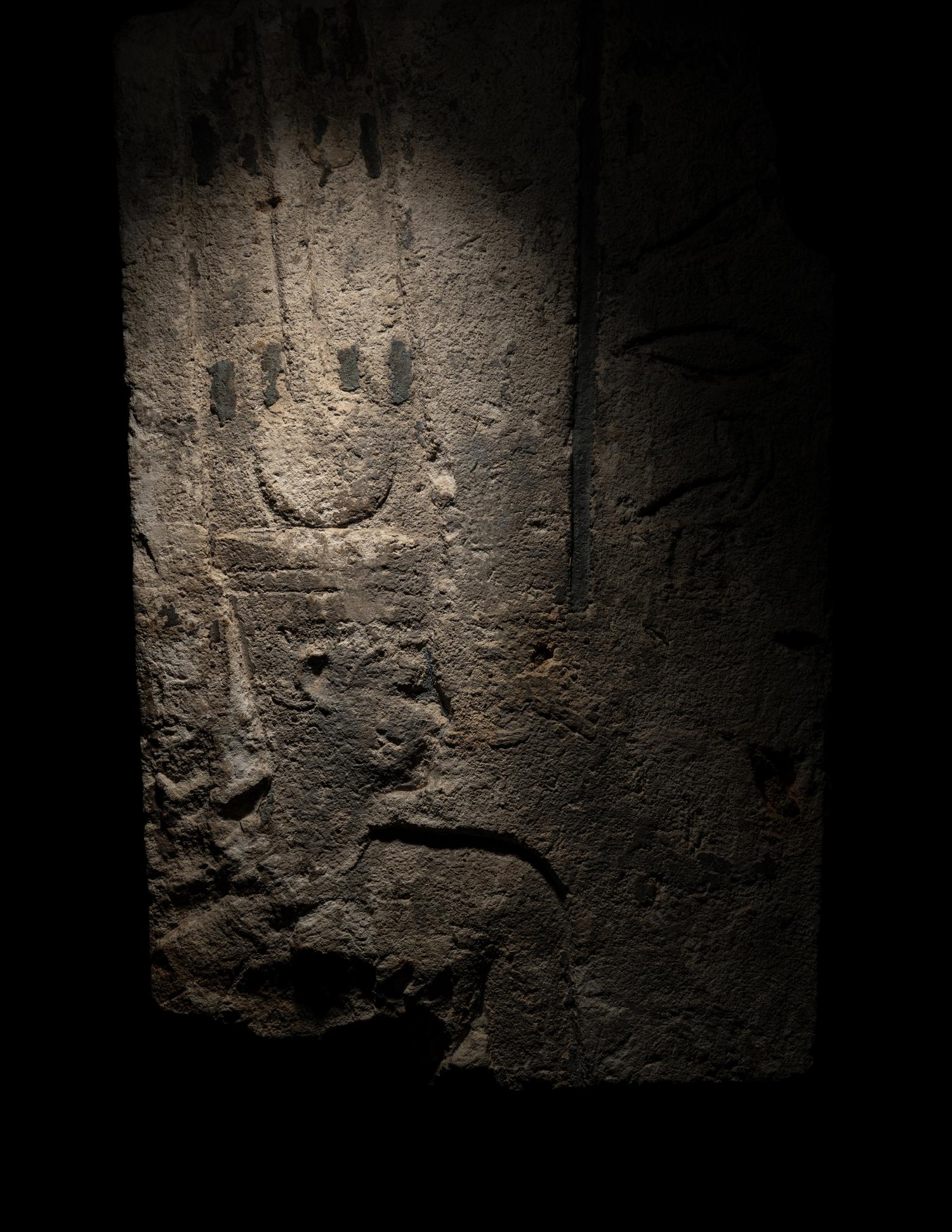 An Egyptian Limestone Relief Fragment with Amun-Re