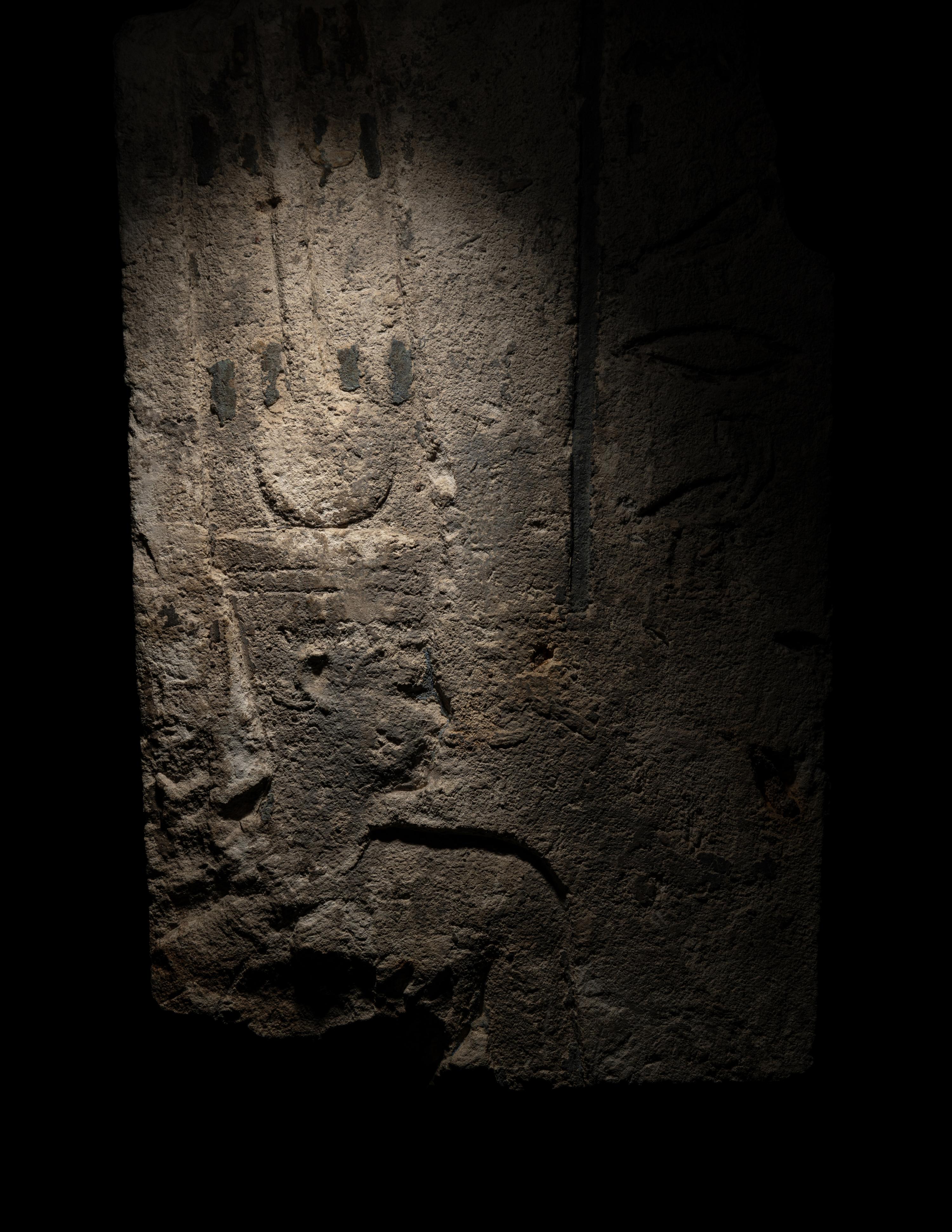 An Egyptian Limestone Relief Fragment with Amun-Re