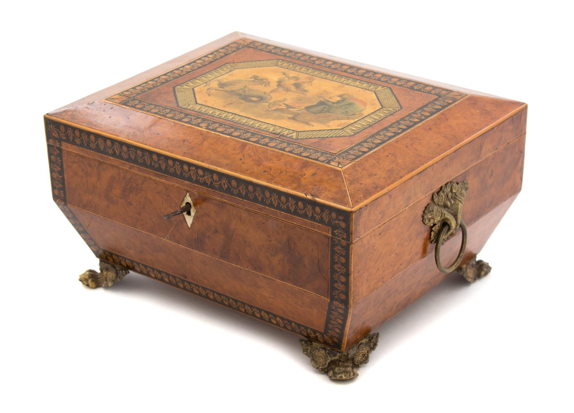 A Regency Inlaid Amboyna and Penwork Sewing Box Height 6 x width 11 x depth 9 inches. — 19TH CENTURY