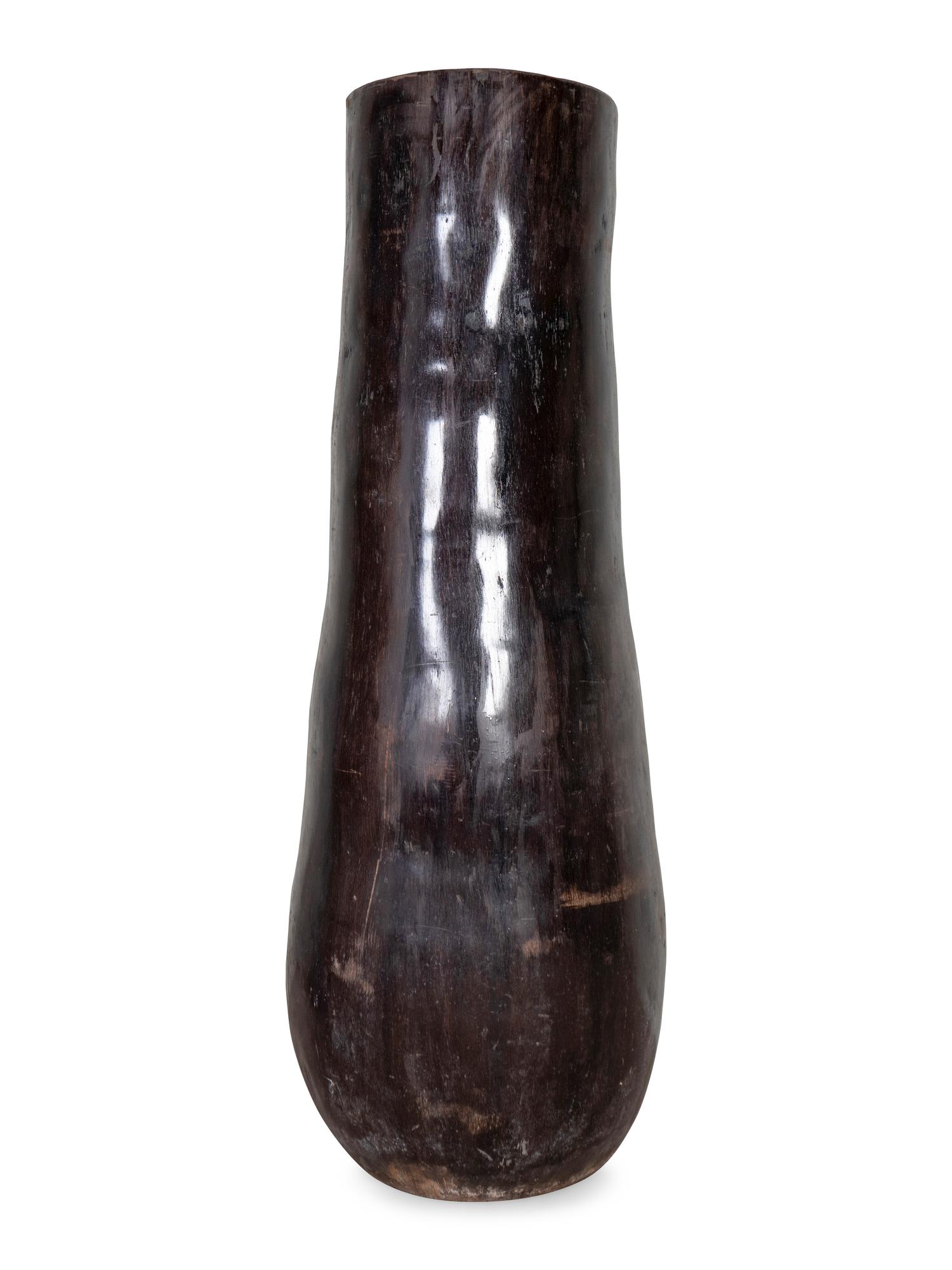 An Indonesian Palm Wood Monumental Vase — 20TH CENTURY