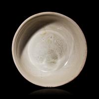 A Chinese Ding -Style Incised White Glazed Porcelain Bowl, Possibly Song Dynasty 或為宋 定窯白釉劃花鳳穿牡丹紋碗