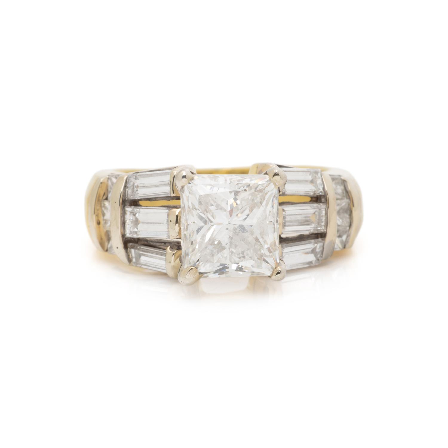 PRINCESS CUT DIAMOND AND YELLOW GOLD RING