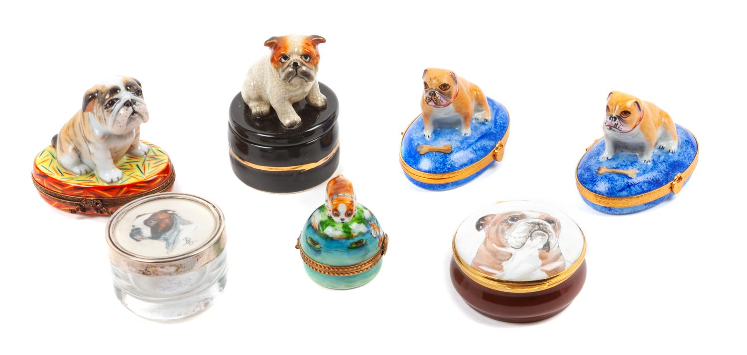 A Group of Seven Bulldog Trinket Boxes Height of tallest 3 1/4 inches.