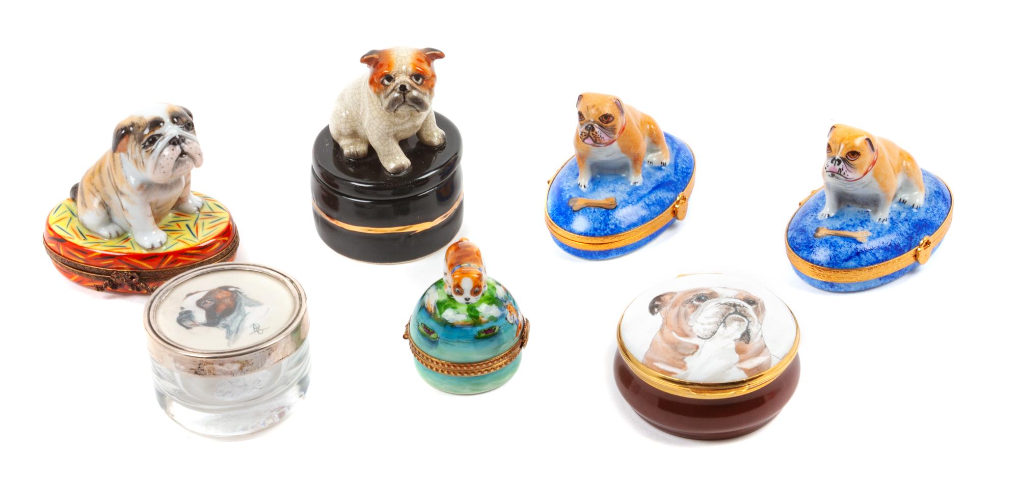 A Group of Seven Bulldog Trinket Boxes Height of tallest 3 1/4 inches.