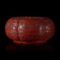A Chinese Cinnabar Lacquer 'Eight Immortals' Covered Box 剔紅八仙圖漆盒