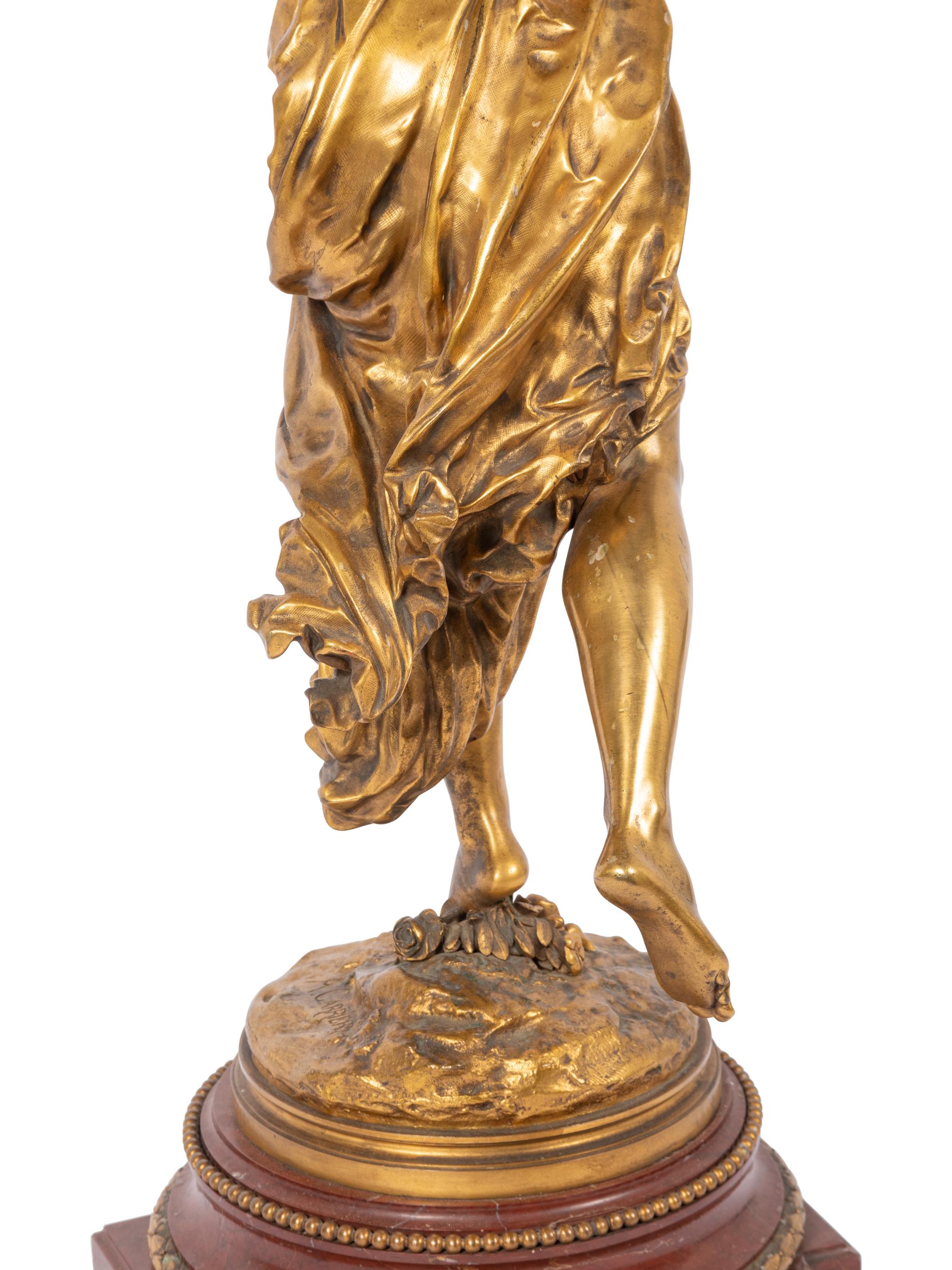 A Large French Gilt Bronze and Marble Figural Candelabrum