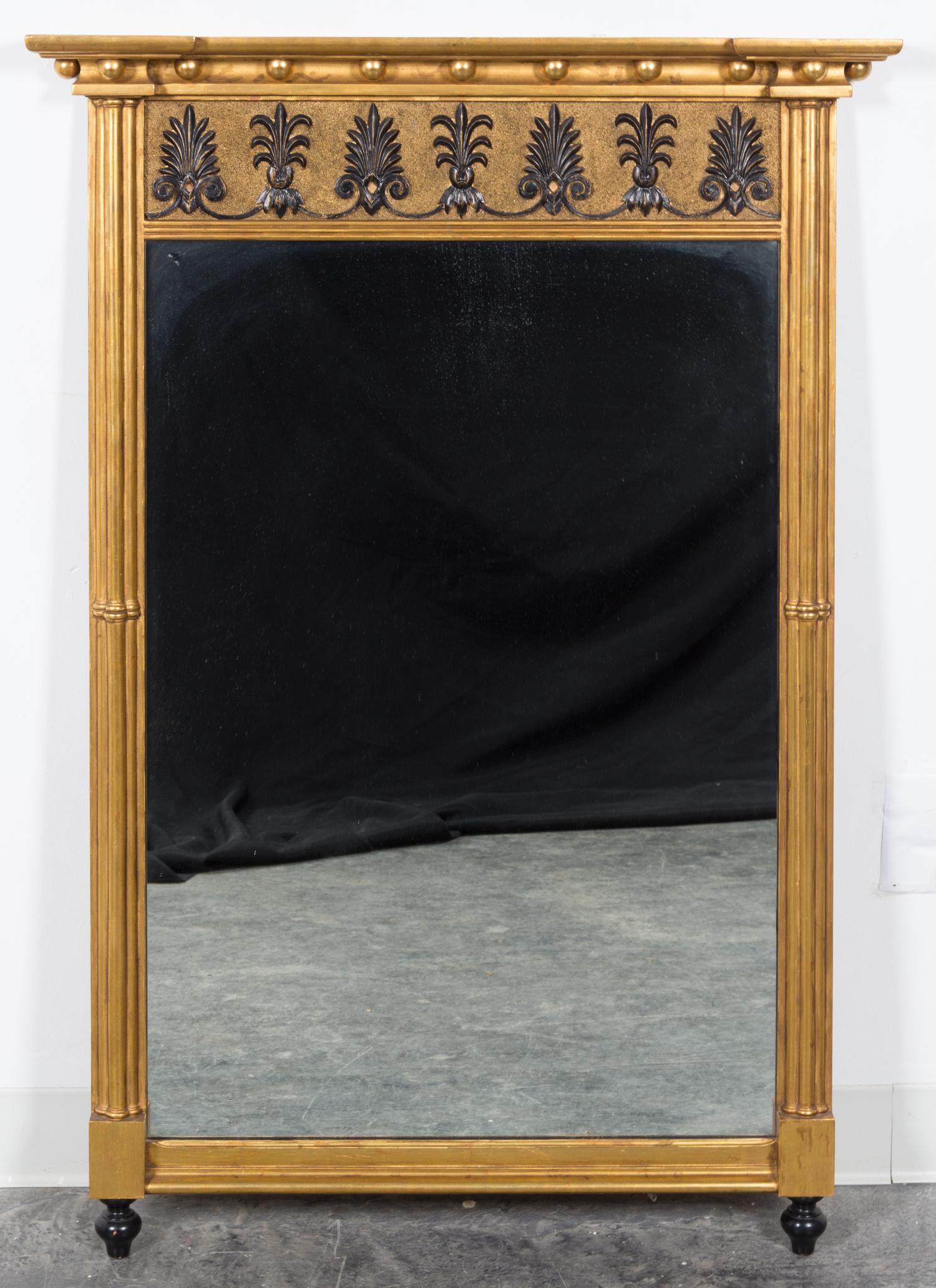 A Regency Style Gilt and Ebonized Mirror Height 46 1/4 x width 32 inches. — SECOND HALF 20TH CENTURY