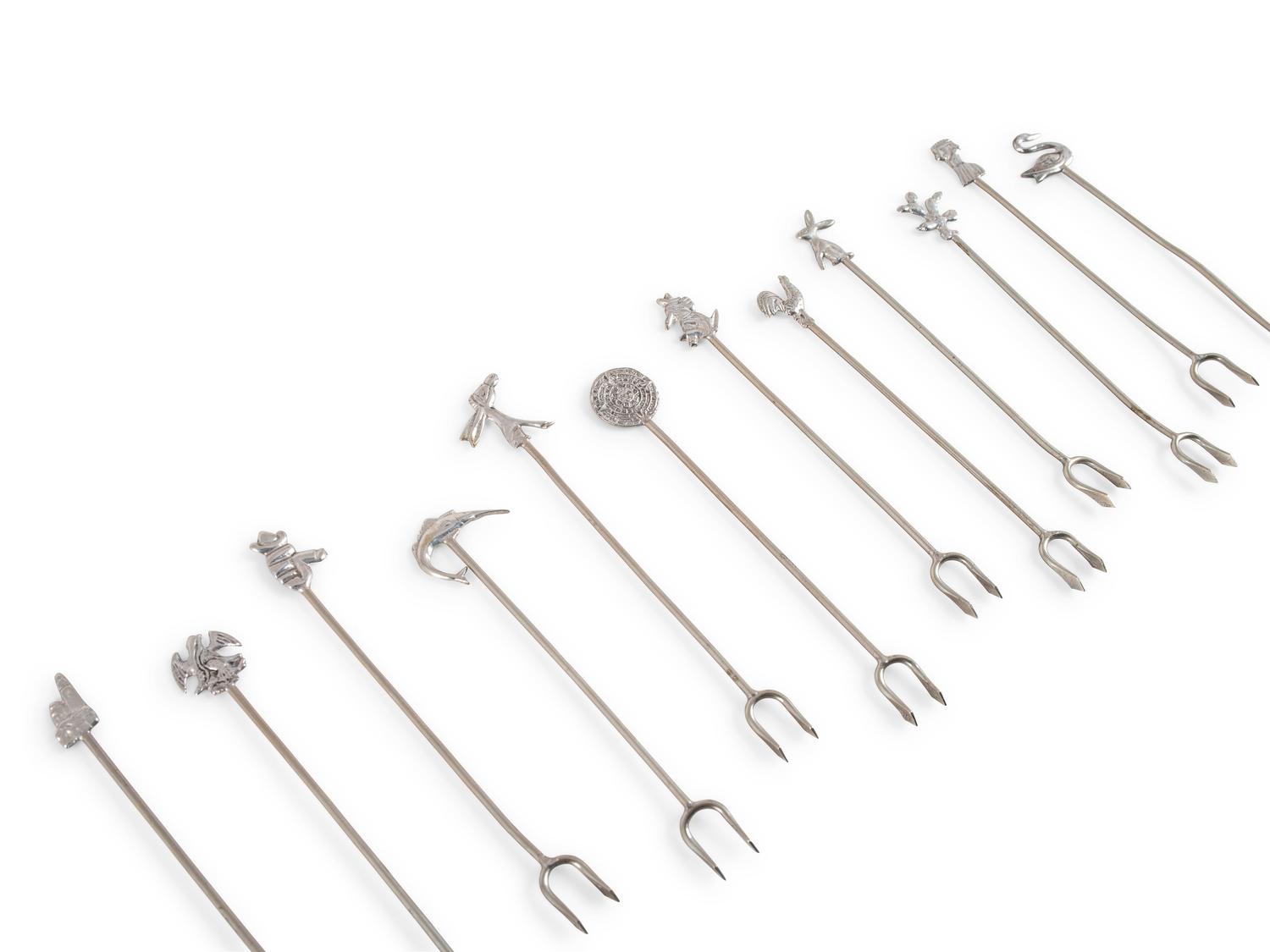 A Group of Coin Silver and Enameled Flatware