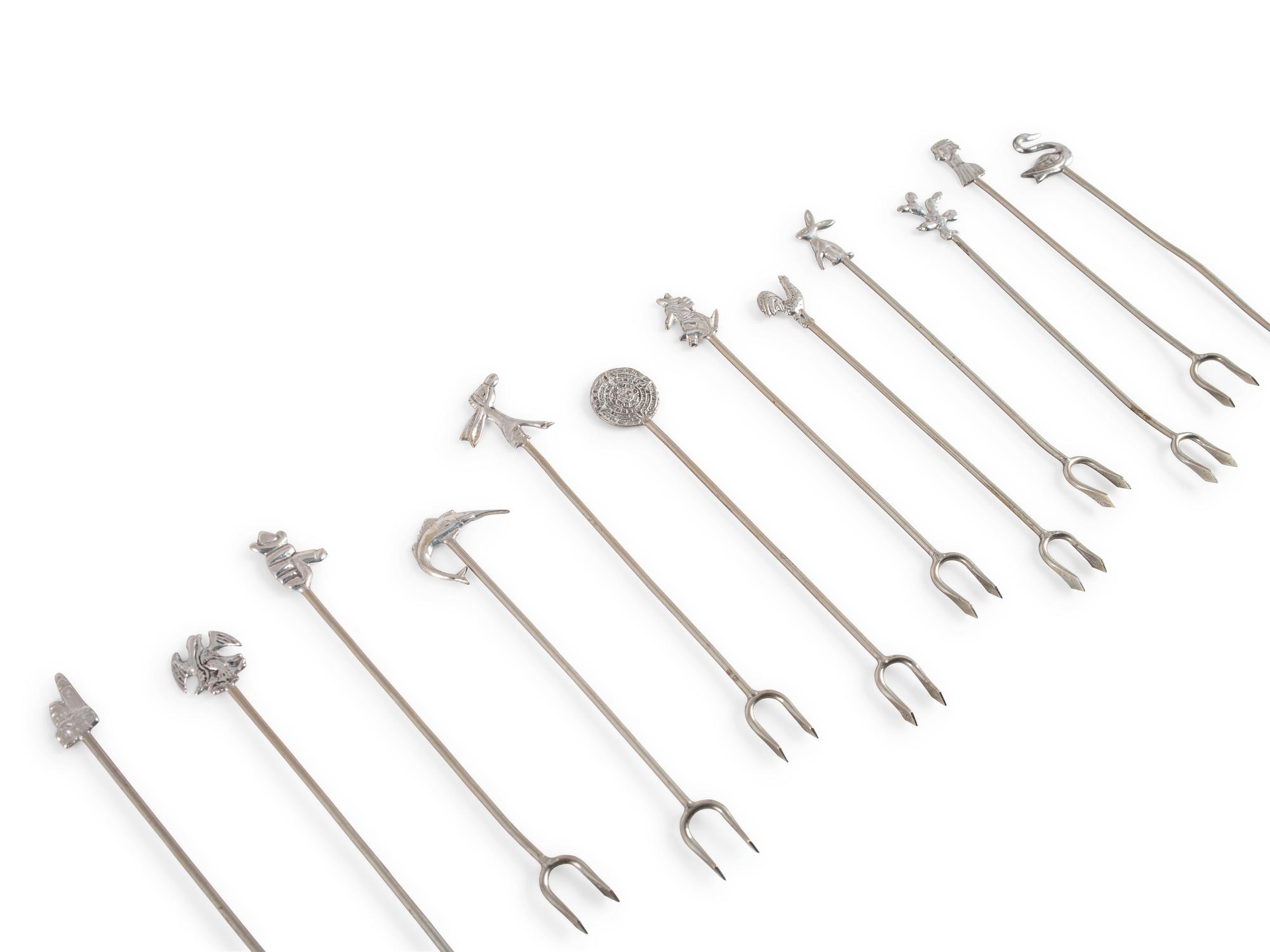A Group of Coin Silver and Enameled Flatware