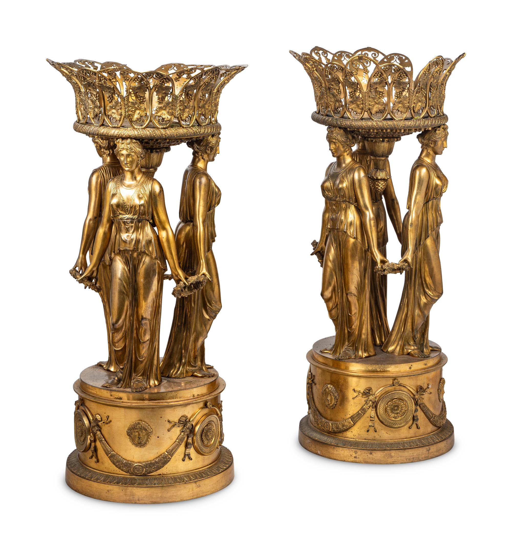 A Pair of Empire Style Gilt Bronze Figural Centerpieces