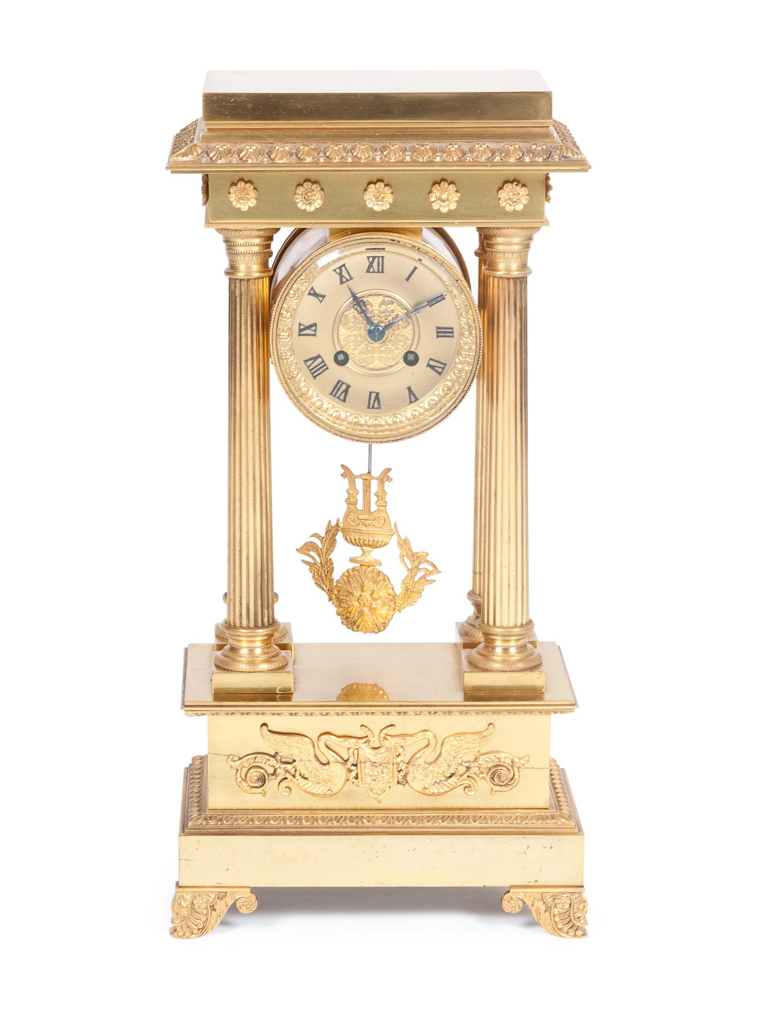 An Empire Style Gilt Bronze Portico Clock — 19TH/20TH CENTURY