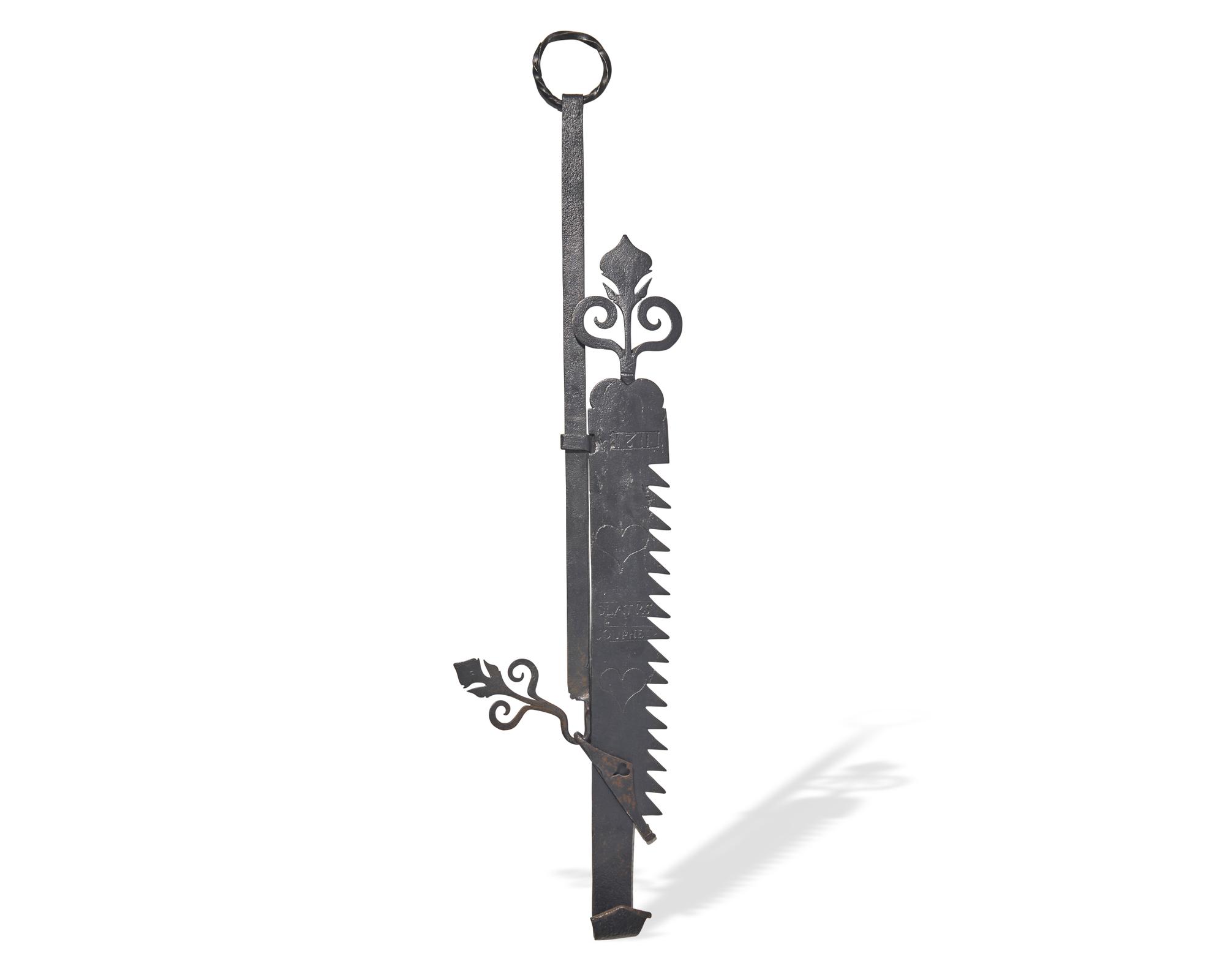 A Wrought Iron Fireplace Trammel, French, Dated "1811"