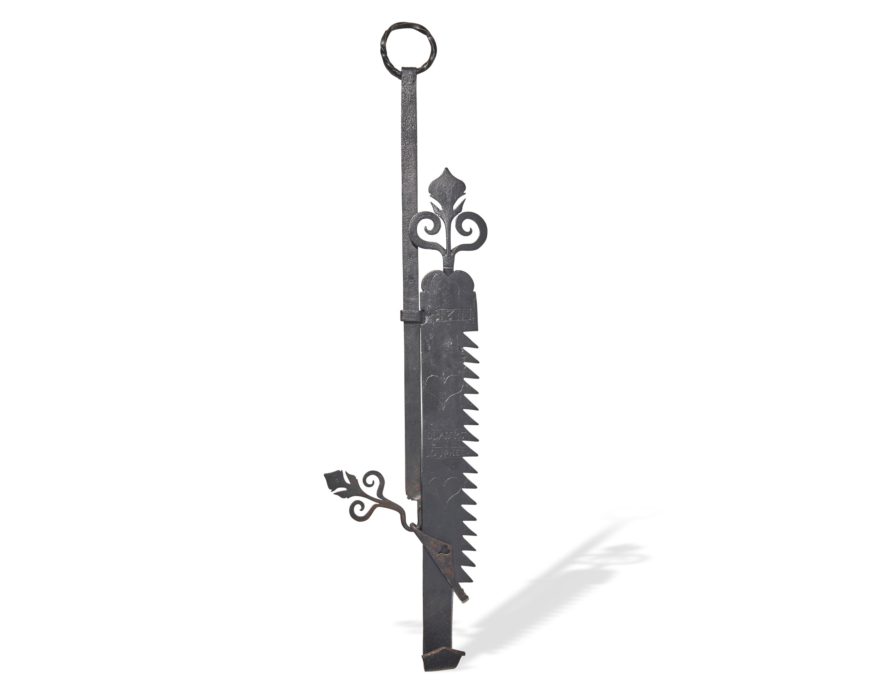A Wrought Iron Fireplace Trammel, French, Dated "1811"