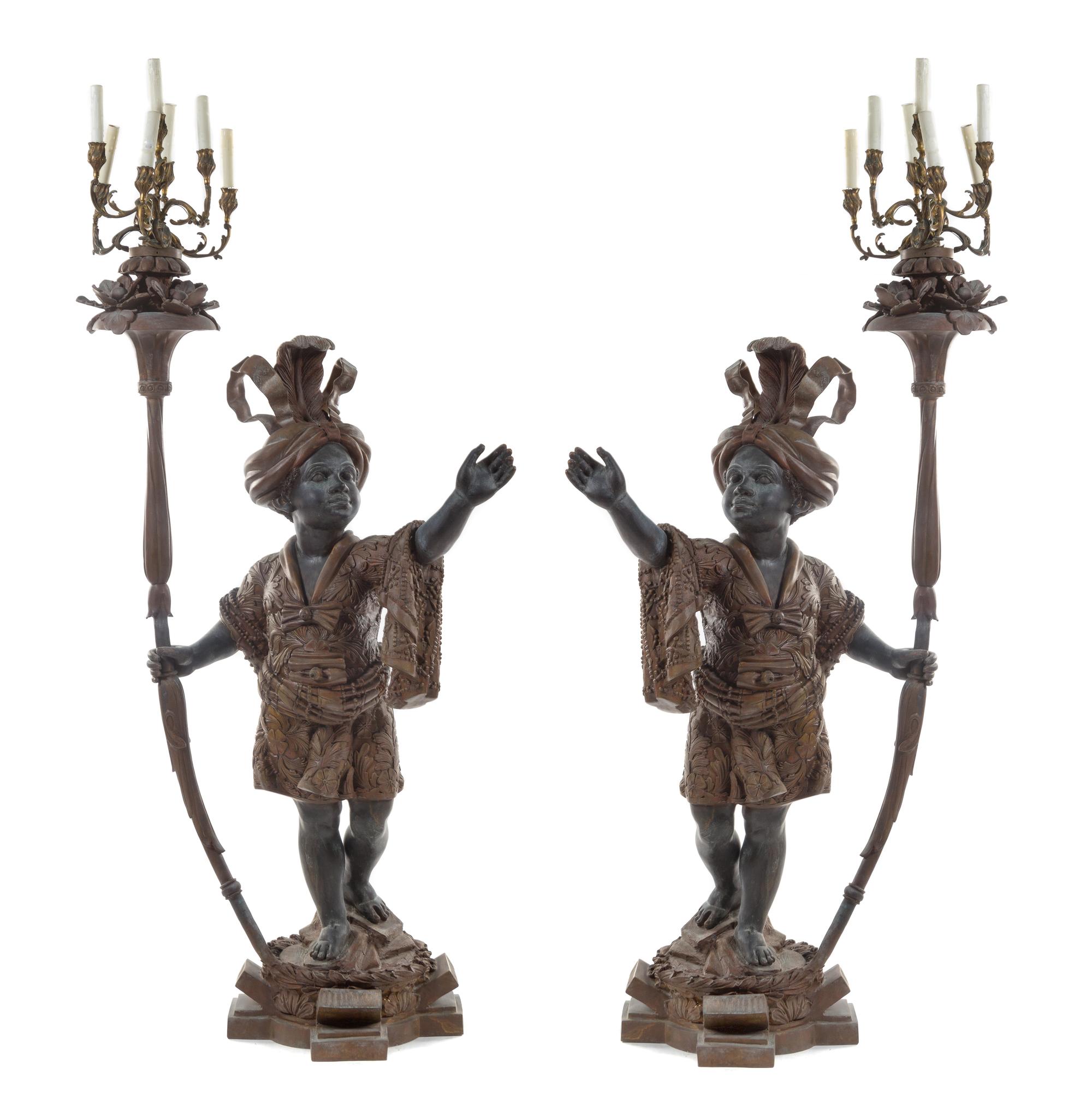 A Pair of Venetian Baroque Style Cast Metal Figural Torcheres Height 72 inches. — 20TH CENTURY