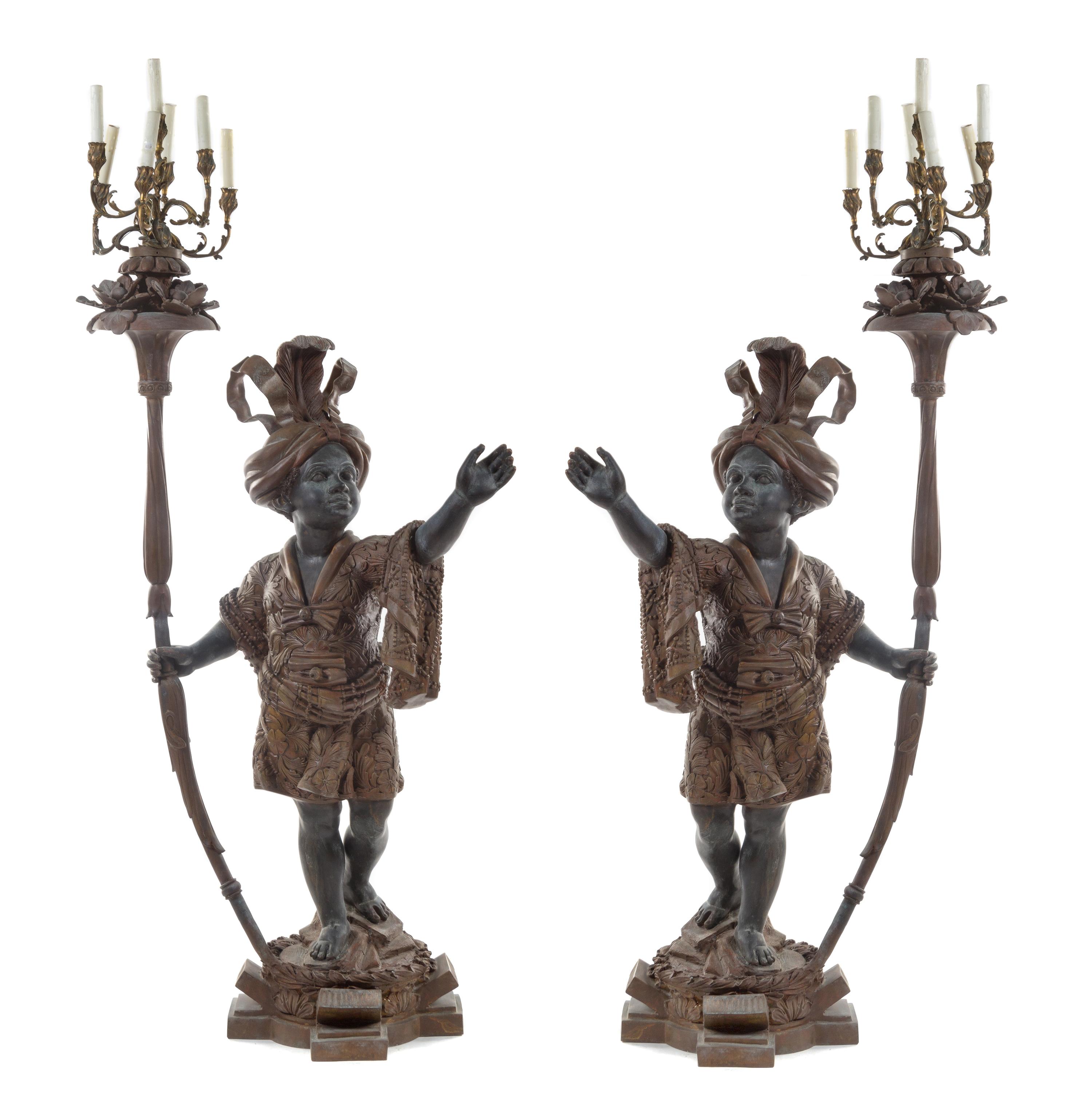 A Pair of Venetian Baroque Style Cast Metal Figural Torcheres Height 72 inches. — 20TH CENTURY