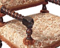 A Baroque Walnut Turned and Carved Barley Twist Armchair