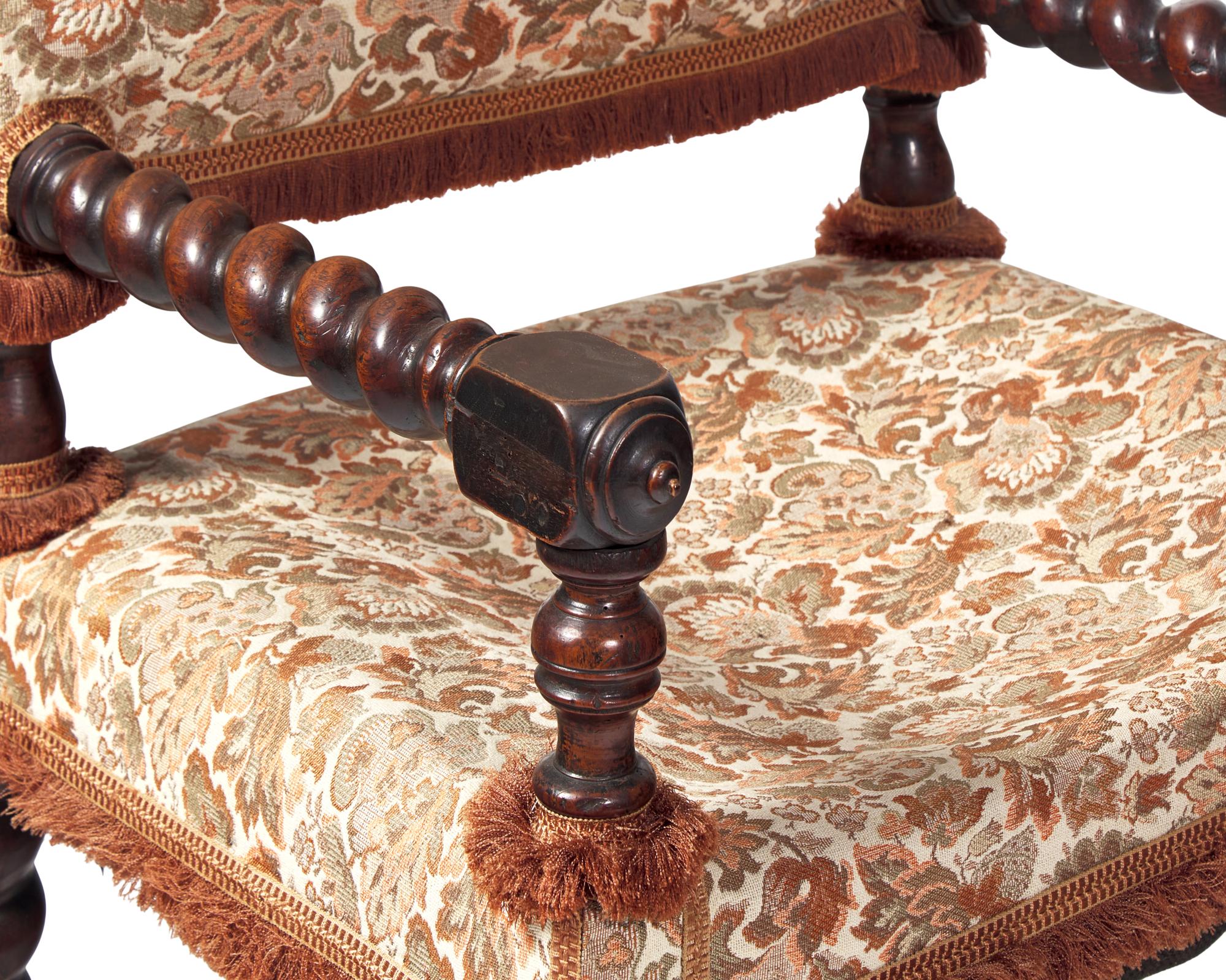 A Baroque Walnut Turned and Carved Barley Twist Armchair