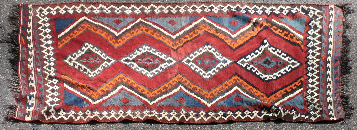 A Caucasian Kilim Wool Rug 9 feet 4 inches x 4 feet 7 inches