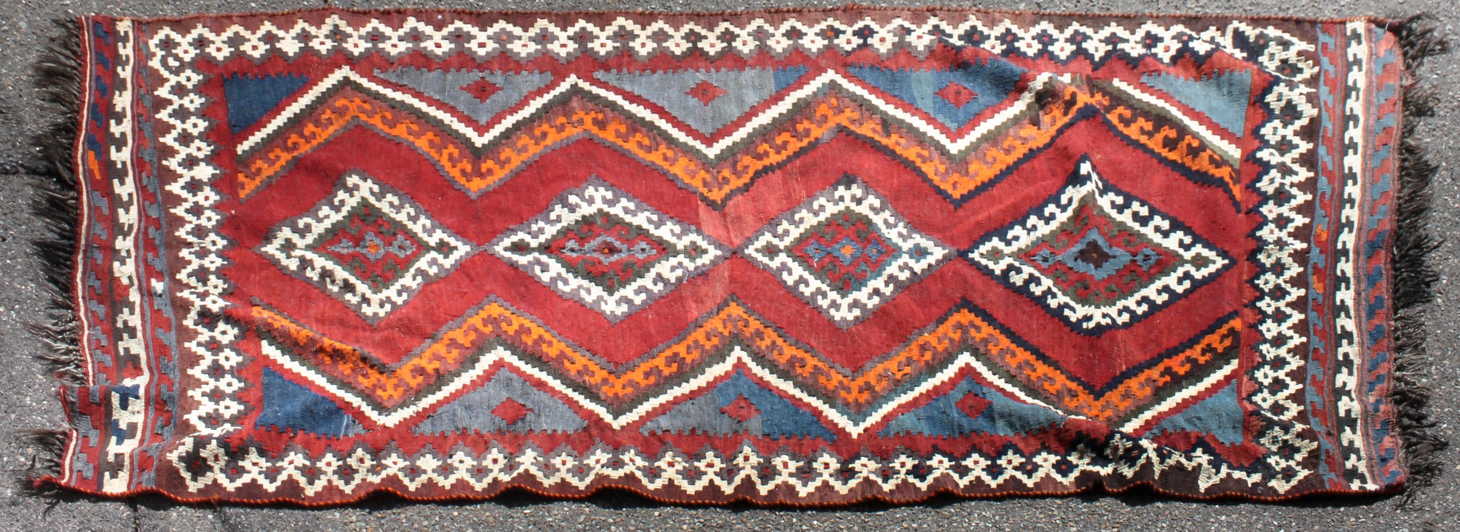 A Caucasian Kilim Wool Rug 9 feet 4 inches x 4 feet 7 inches