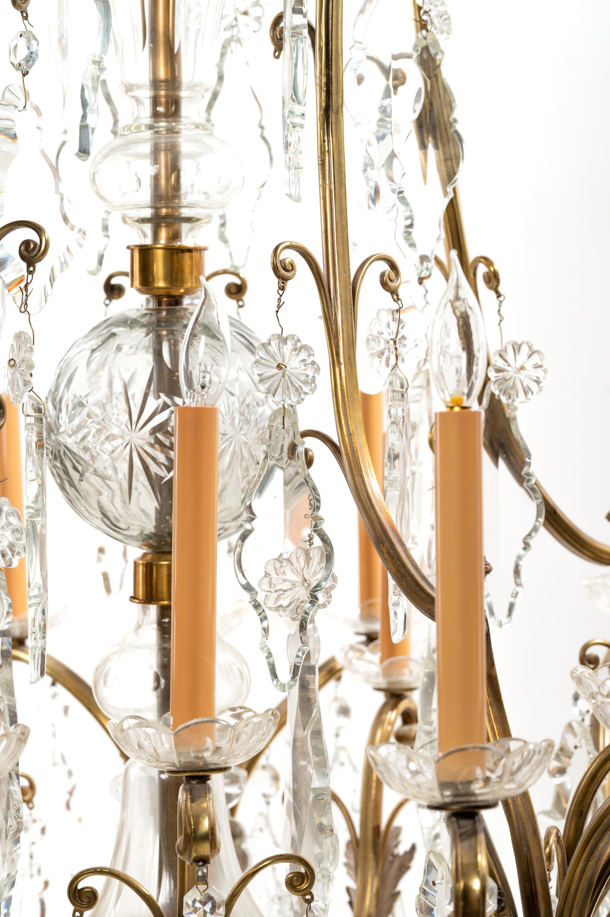 A French Gilt Metal and Glass Twenty-Light Chandelier