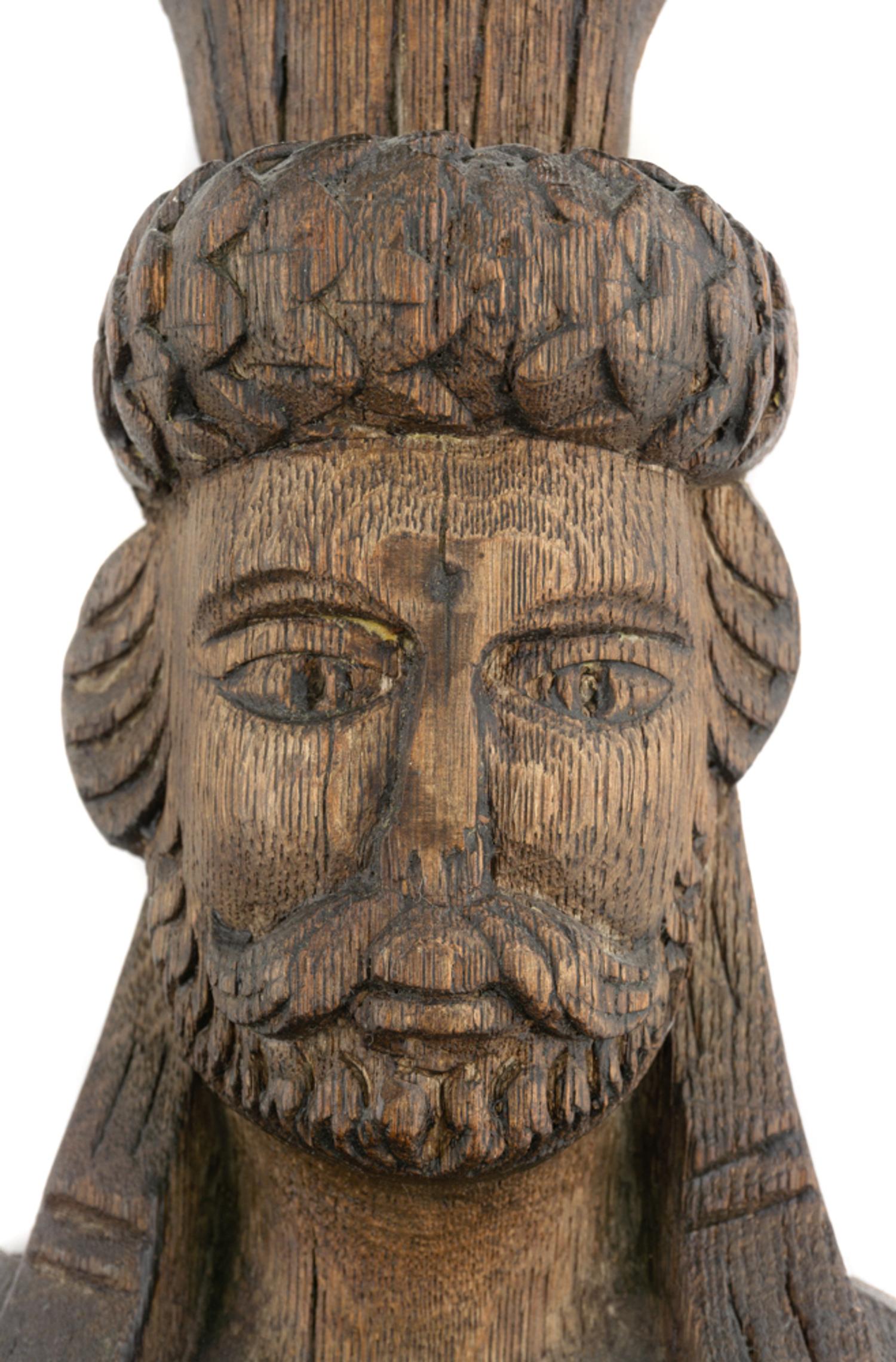 A Group of Three Carved Oak Figural Pilasters