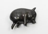 A Bronze Model of a Sleeping Pig Width 7 inches. — 20TH CENTURY