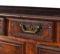 A French Provincial Carved Oak Cabinet
