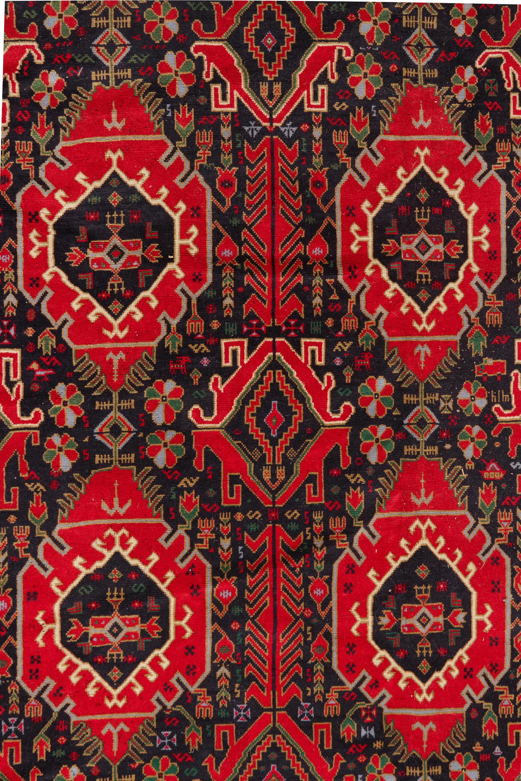 A Persian Bokhara Wool Rug