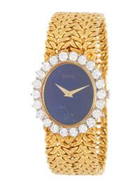 PIAGET, 18K YELLOW GOLD, DIAMOND, AND LAPIS LAZULI WATCH