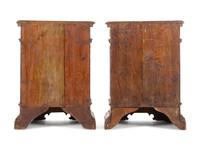 A Pair of North Italian Carved and Paneled Walnut Cabinets