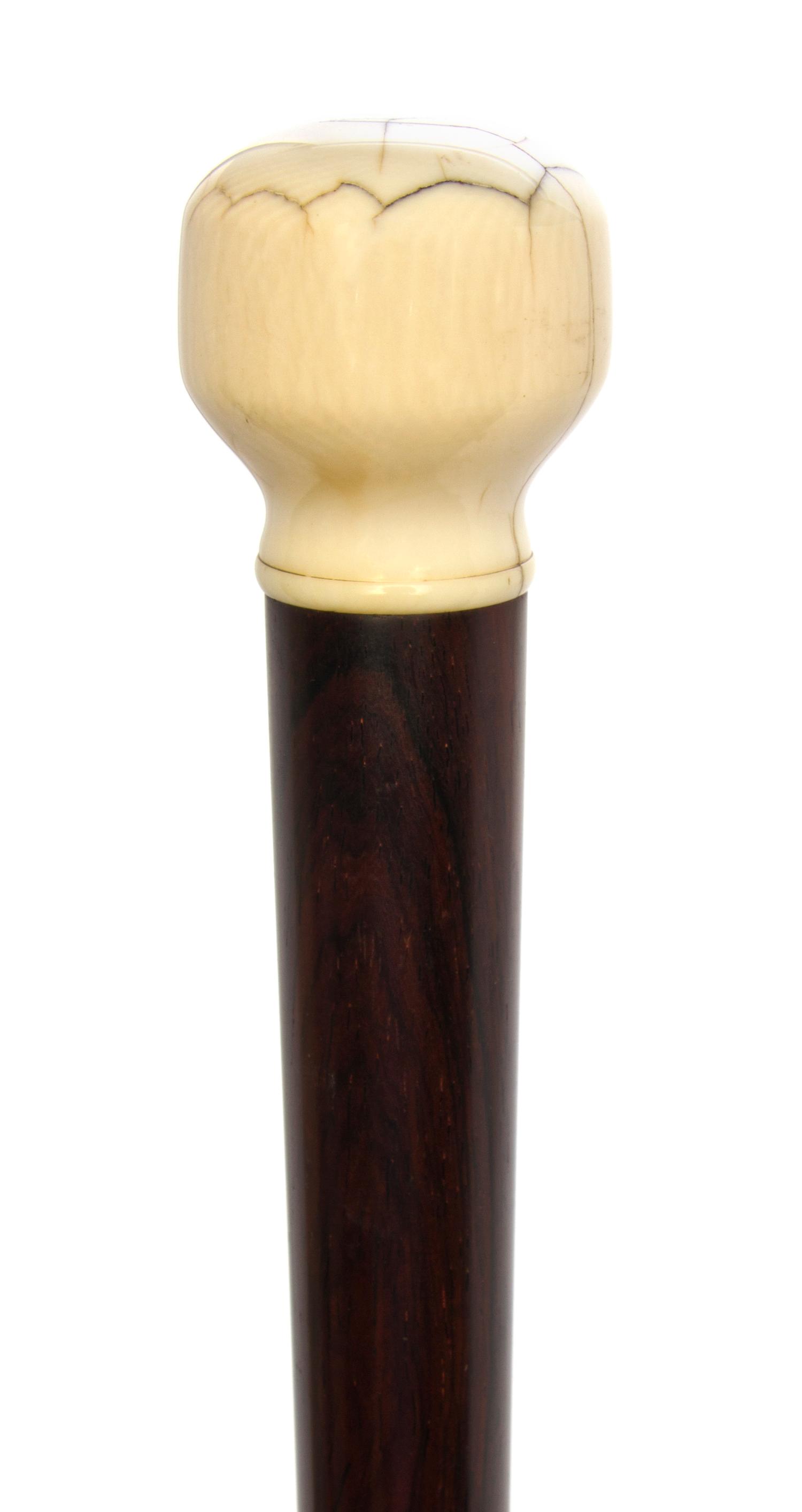 An American Ivory Handled Walking Stick, Length of handle 1 5/8 x length overall 36 1/4 inches.