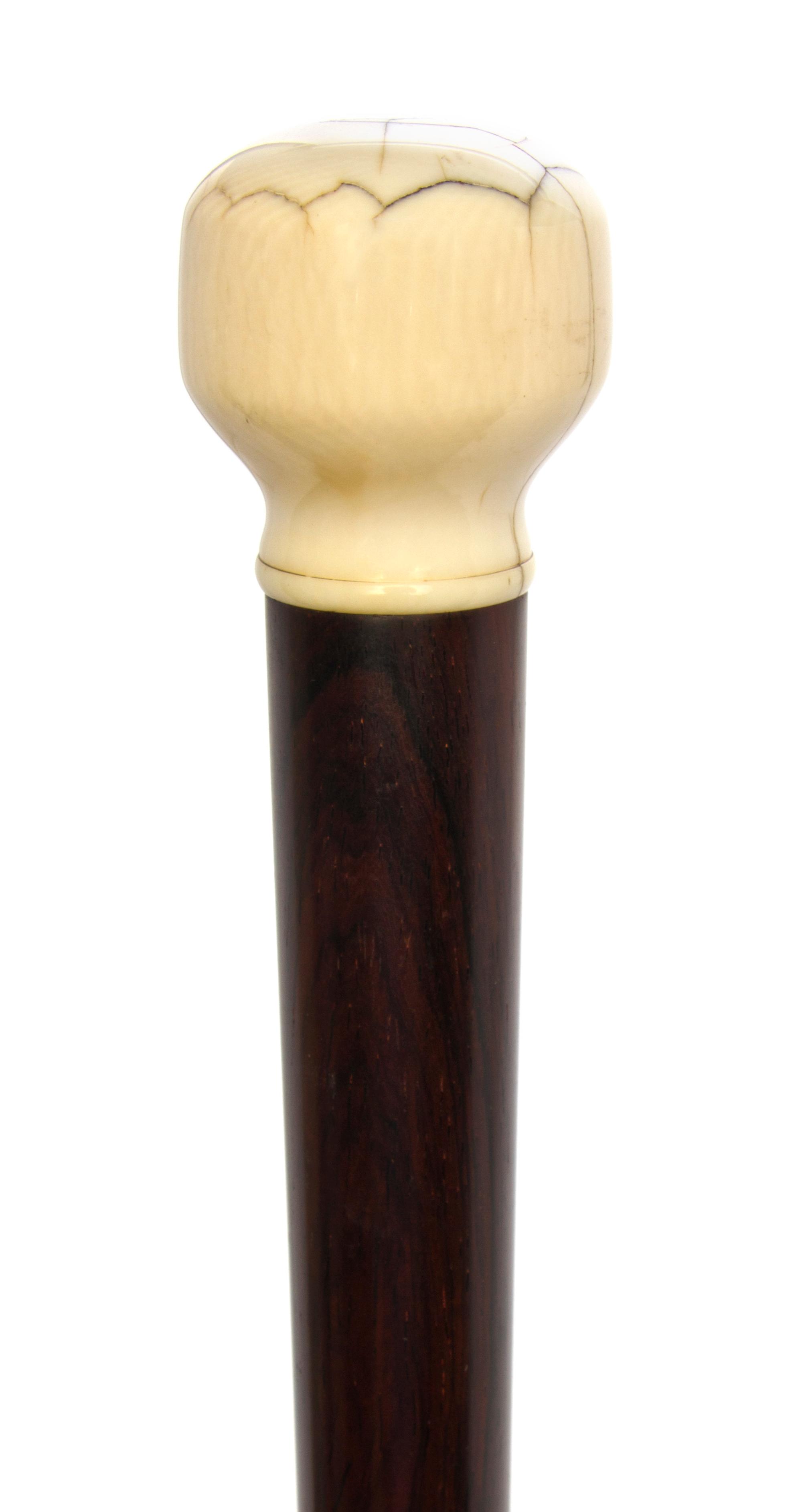 An American Ivory Handled Walking Stick, Length of handle 1 5/8 x length overall 36 1/4 inches.