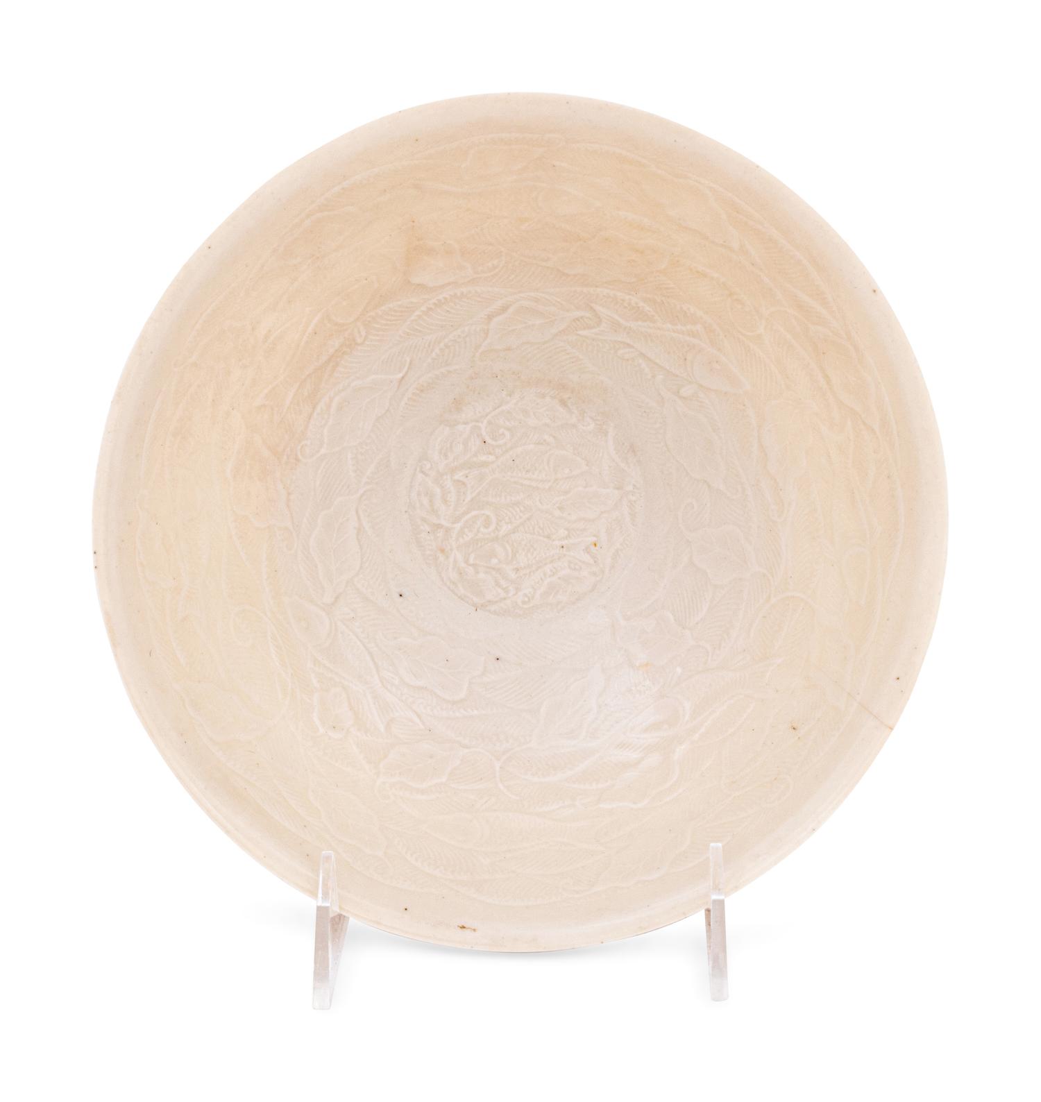 A Japanese White Glazed Molded Bowl