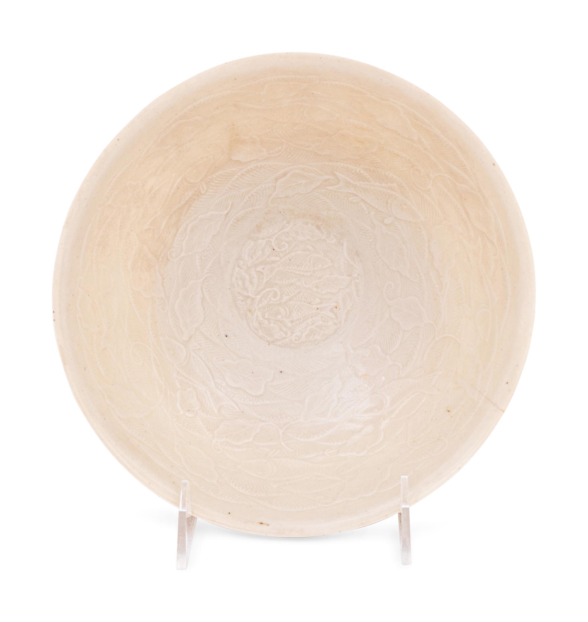 A Japanese White Glazed Molded Bowl