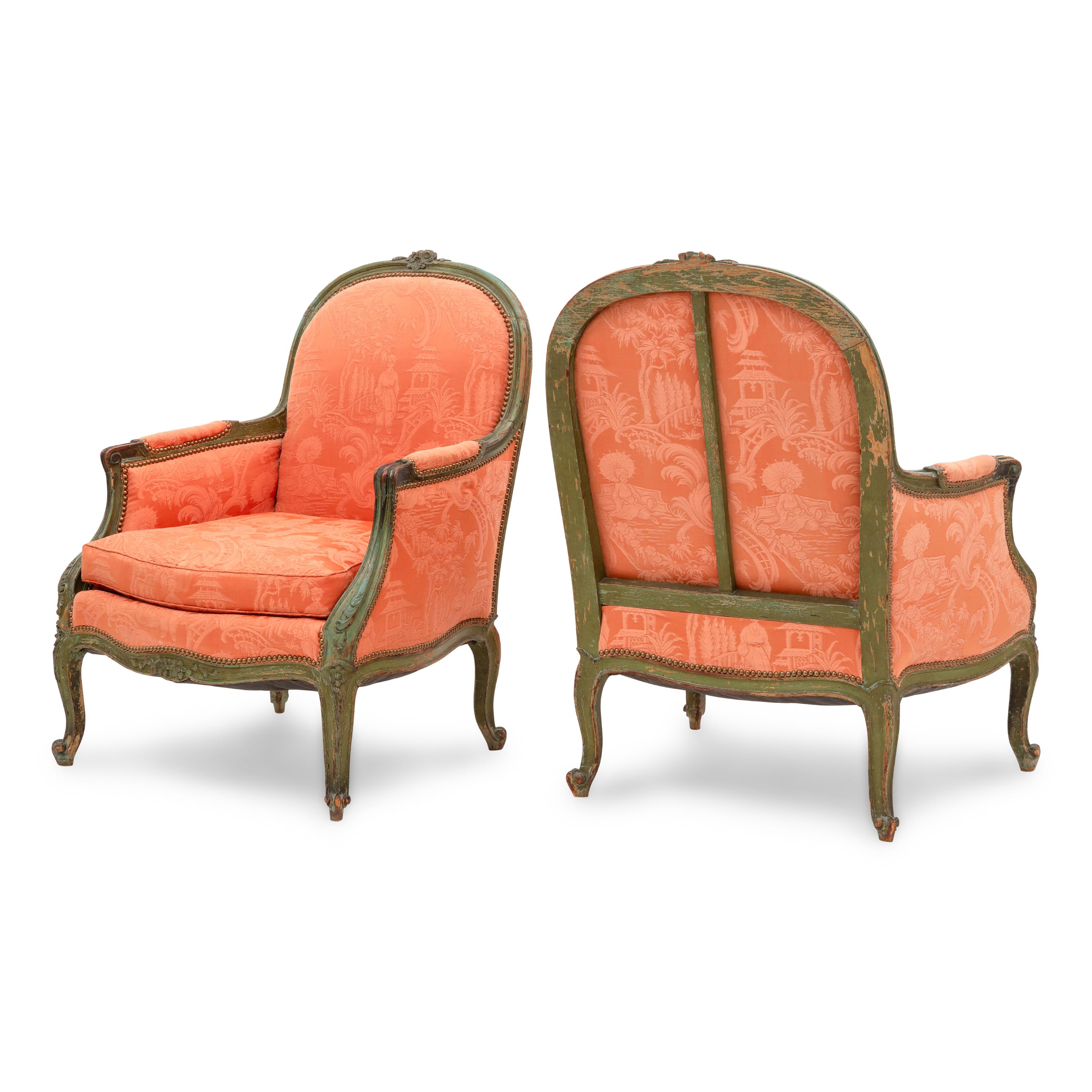 A Pair of Louis XV Green Painted Bergères