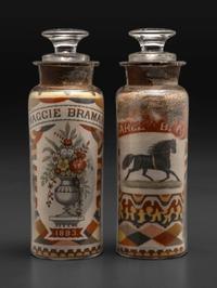 A Pair of Andrew Clemens (American, 1857-1894) 'Sweetheart' Sand Bottles