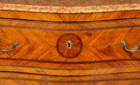 A Pair of Italian Bois de Rose Marble-Top Commodes