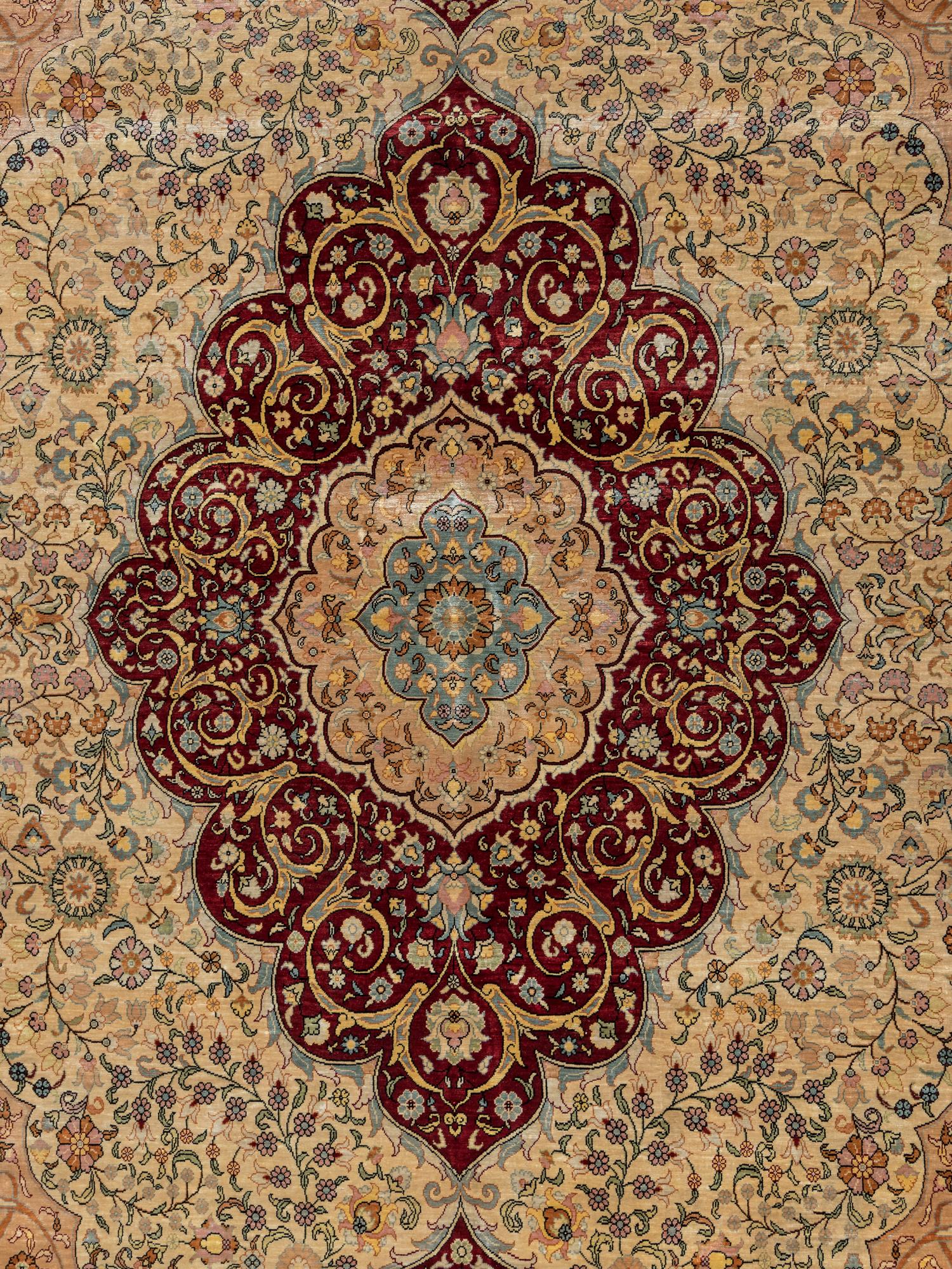 A Signed Tabriz Silk Rug